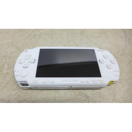 5084 - A Sony PlayStation PSP-1003 KCW portable PlayStation console - ceramic white - with box, battery pac... 