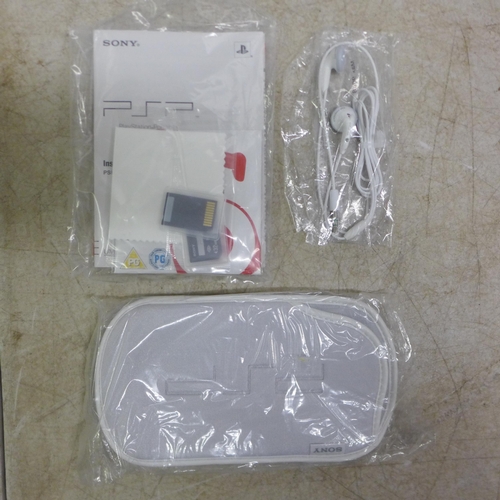 5084 - A Sony PlayStation PSP-1003 KCW portable PlayStation console - ceramic white - with box, battery pac... 