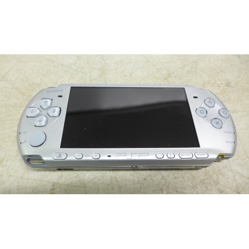 5085 - A Sony PSP Slim and Lite Mystic silver hand held console - PSP-3003 MS in box