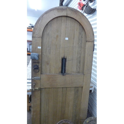 5200 - A solid oak curved top external door