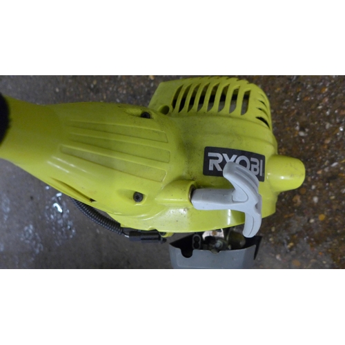 5216 - A Ryobi Power LT2 petrol driven strimmer