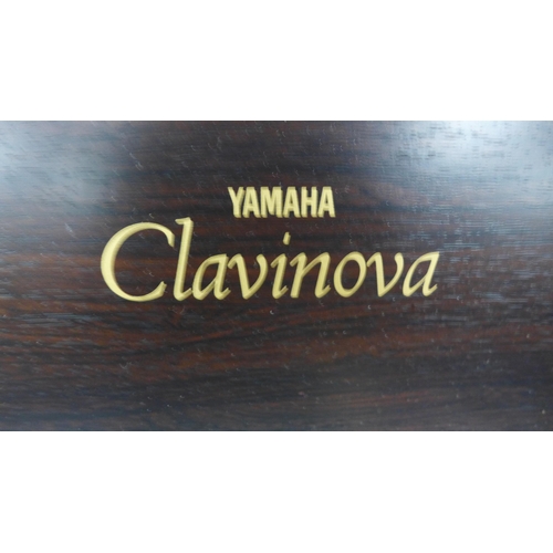 5241 - A Yamaha Clavinova CVP-87A digital piano with power supply and piano stool