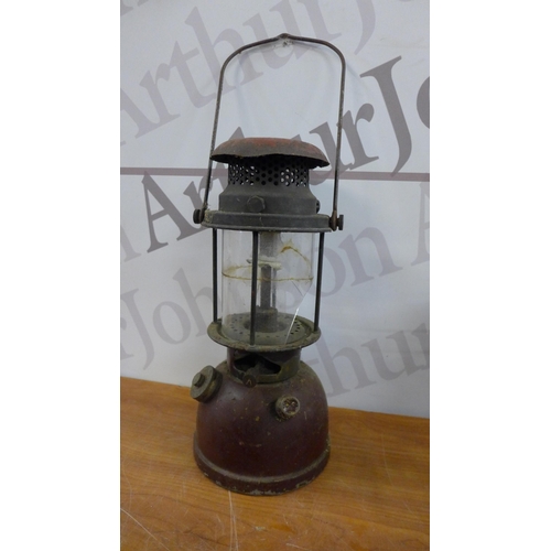 5254 - A collection of vintage blow lamps, pressure lamps and hurricane lanterns