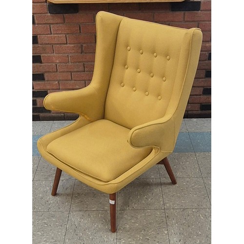 90 - A Danish style ash and mustard fabric armchair