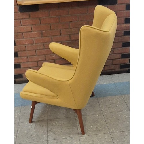 90 - A Danish style ash and mustard fabric armchair