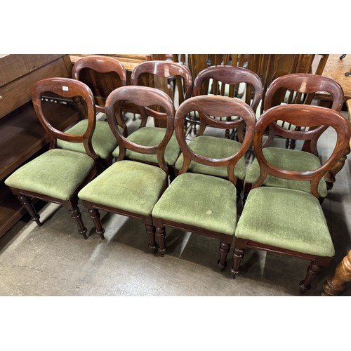 202 - A set of eight Victorian mahogany balloon back dining chairs