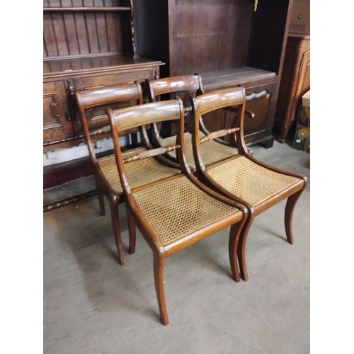 241 - A set of four Regency mahogany bergere chairs and seven other bergere chairs