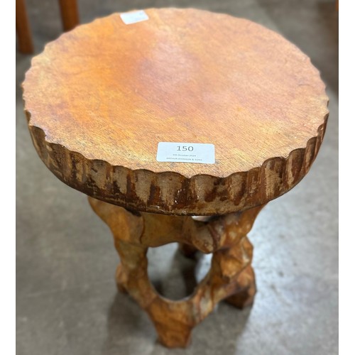 150 - A carved root wood live edge stool