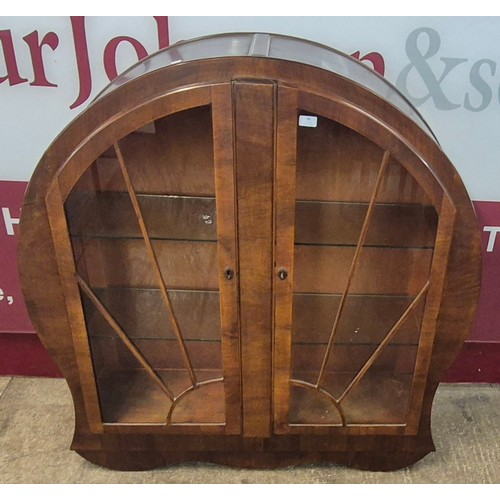 96 - An Art Deco walnut circular display cabinet