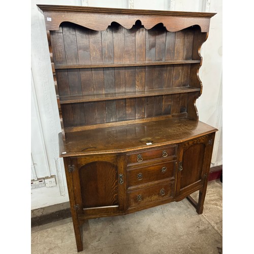 155 - An 18th Century style carved oak dresser