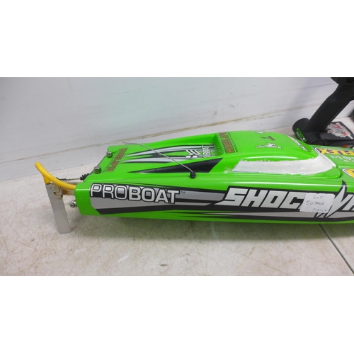 5076A - A wheelspin models Shockwave Proboat remote controlled speed boat and a DX2E DSMR radio system, batt... 