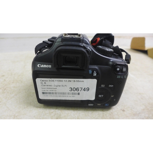 5091 - A Canon EOS 1100D 12.2m 18-55mm digital SLR camera with battery and charger