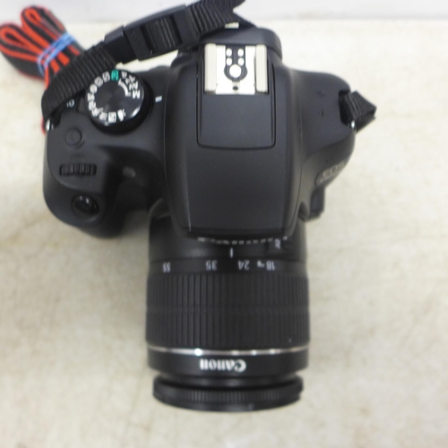 5092 - A Canon DS126621 digital SLR camera with a canon EF-S 18-55mm macro zoom lens, battery, charger and ... 