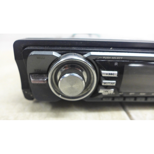 5093 - An X-Trons DVD MP4 USB/SD AM/FM in car stereo and DVD player