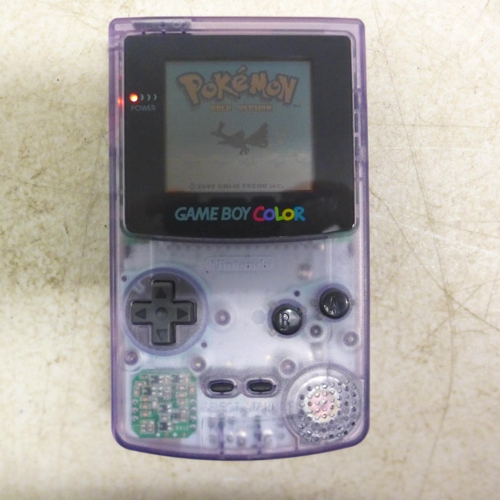 5102 - A Gameboy Colour CGB-001 with 5 games including Pokemon Gold, Tomb Raider, Donkey Kong Country, etc.... 