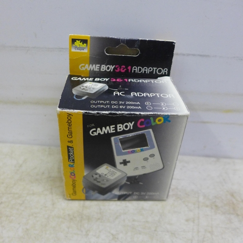 5102 - A Gameboy Colour CGB-001 with 5 games including Pokemon Gold, Tomb Raider, Donkey Kong Country, etc.... 