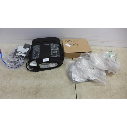 5105 - An Inogen One G3 (model IO-300) oxygen concentrator with accessories