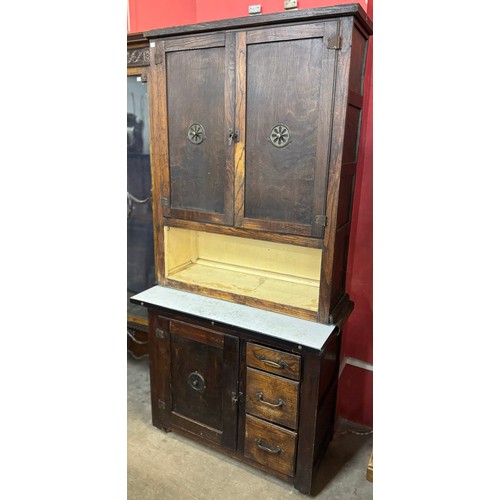 166 - An early 20th Century oak kitchen cabinet