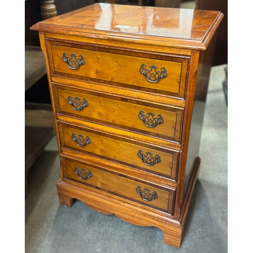 169 - A George III style yew wood chest of drawers