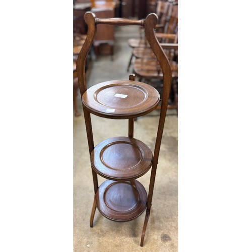 173 - An Edward VII inlaid mahogany folding cake stand