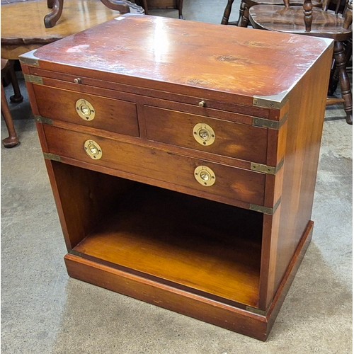 111A - A campaign style yew wood and brass mounted side cabinet