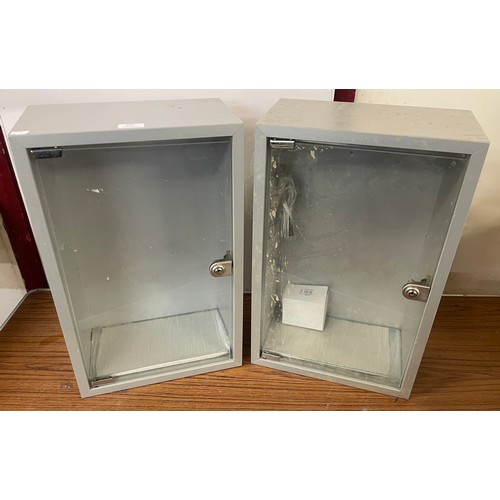 283 - Two metal display cabinets