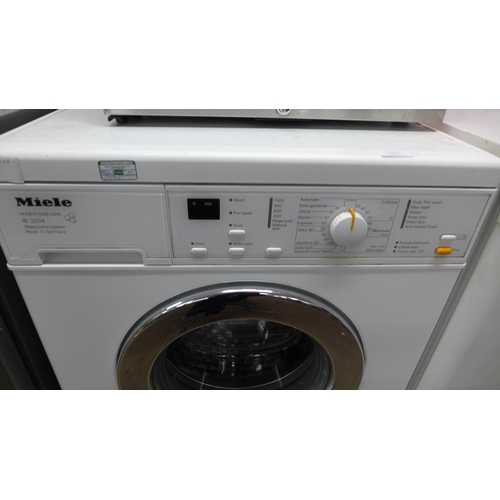 5171 - A Miele W3204 Honeycomb care 1300 spin washing machine