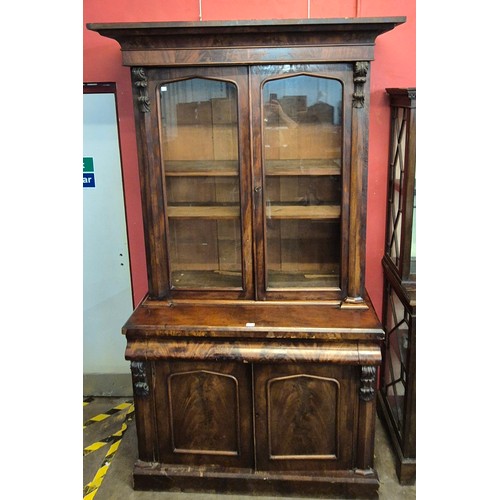 125 - A Victorian carved mahogany bookcase