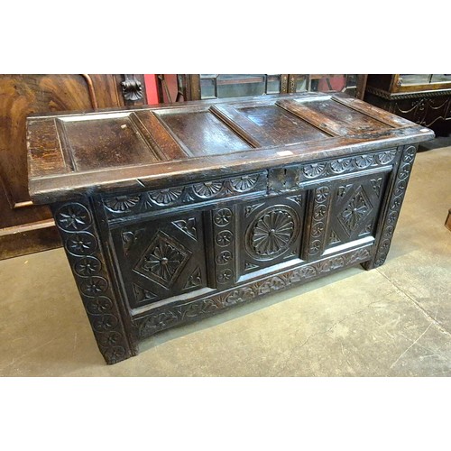 117 - A Charles II carved oak coffer