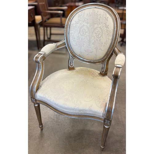 195 - A French Louis XV style gilt and fabric upholstered fauteuil chair