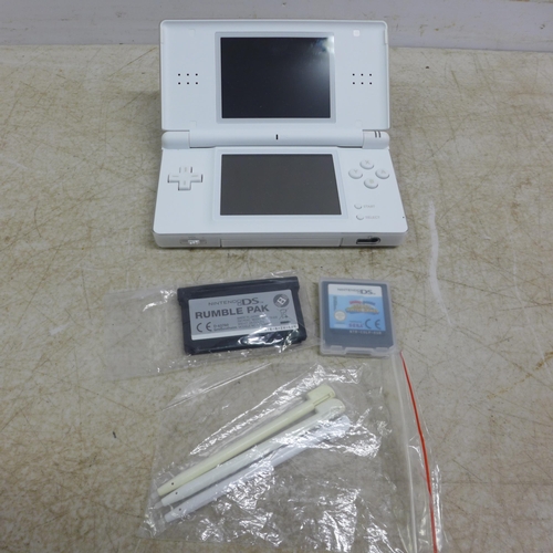 5113 - A Nintendo DS lite USG-001 with 2 games and 3 stylus