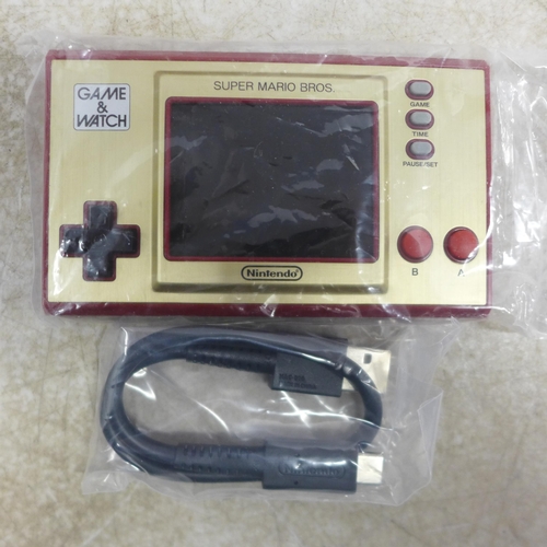 5116 - A Nintendo Game and Watch Super Mario Bros hand held game