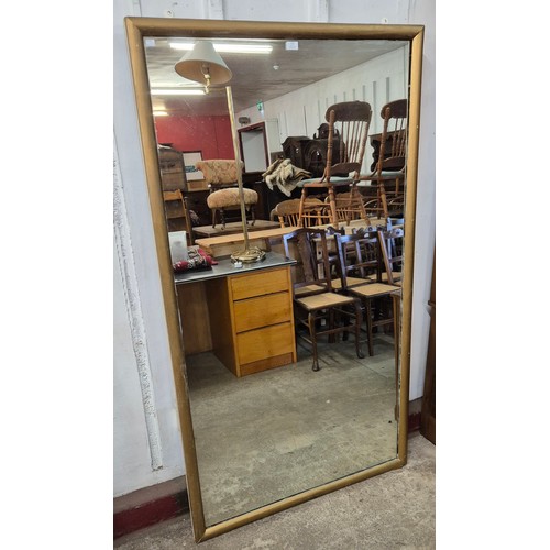 122 - A large Victorian gilt framed shop mirror