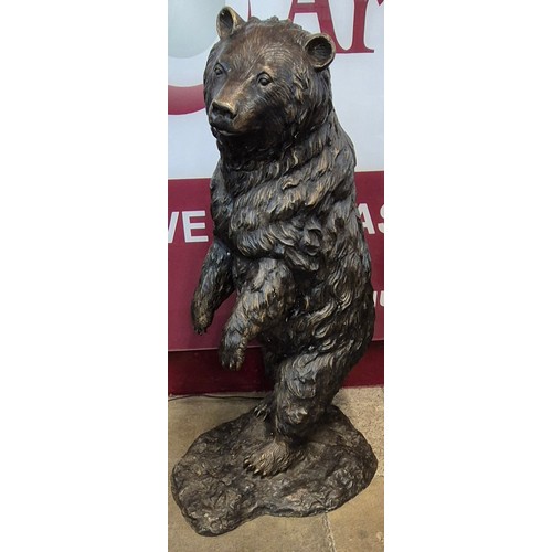 126 - A large Black Forest style bronze figure of a grizzly bear