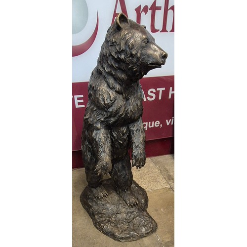 126 - A large Black Forest style bronze figure of a grizzly bear