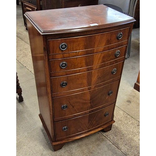 132 - A Regency style mahogany bow front chest of drawers