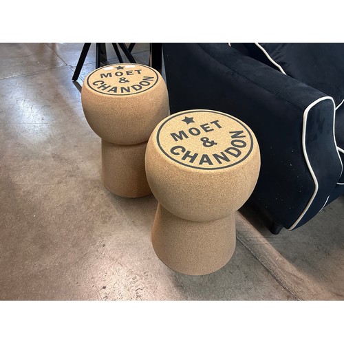 3021 - A pair of extra large Champagne cork footstools