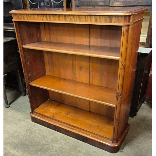 140 - A Victorian walnut open bookcase