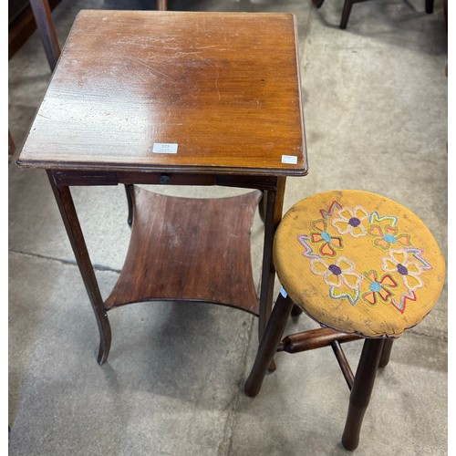 223 - An early 20th Century mahogany stool and lamp table