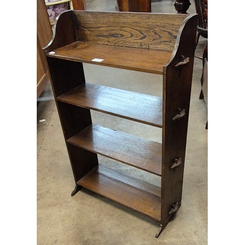 149 - A small Arts & Crafts oak open bookcase