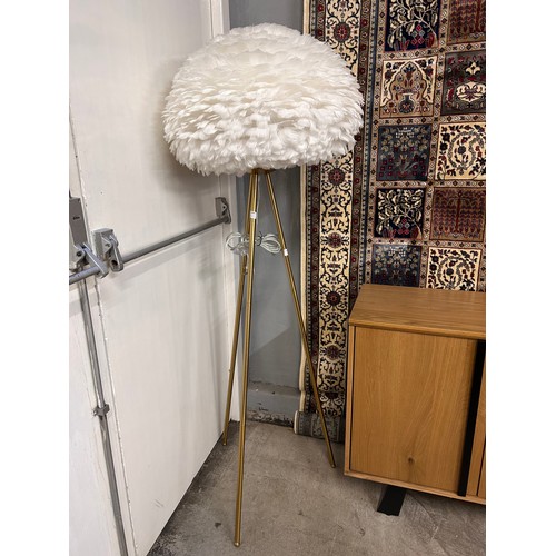 3048 - A large white feather floor standing lamp