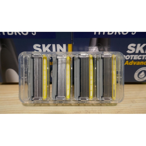 6106 - 2 x Wilkinson Hydro 5 razors and a pack of four spare blades (337-137,138) *This lot is subject to V... 