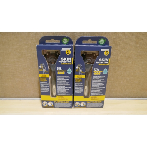 6106 - 2 x Wilkinson Hydro 5 razors and a pack of four spare blades (337-137,138) *This lot is subject to V... 