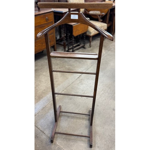 234 - An early 20th Century oak Gentleman's valet stand