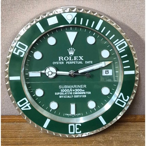 350 - A Rolex style dealers display wall clock