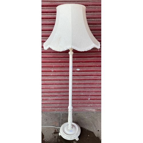 235 - A white painted standard lamp