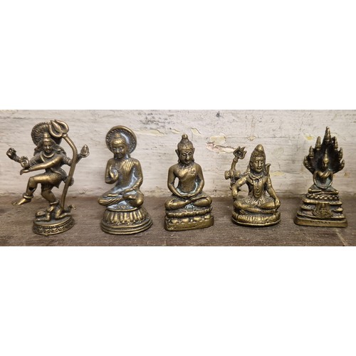 353 - A large eastern brass figure of dancing Shiva and five small brass figures of deities