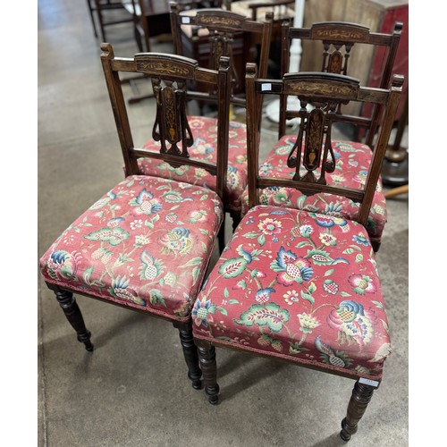 237 - A set of four Edward VII inlaid rosewood dining chairs