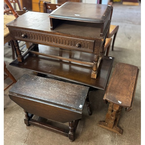 240 - A carved oak telephone seat, old charm coffee table and two small drop leaf tables