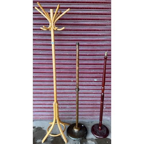 243 - Two standard lamps and a beech bentwood coat stand